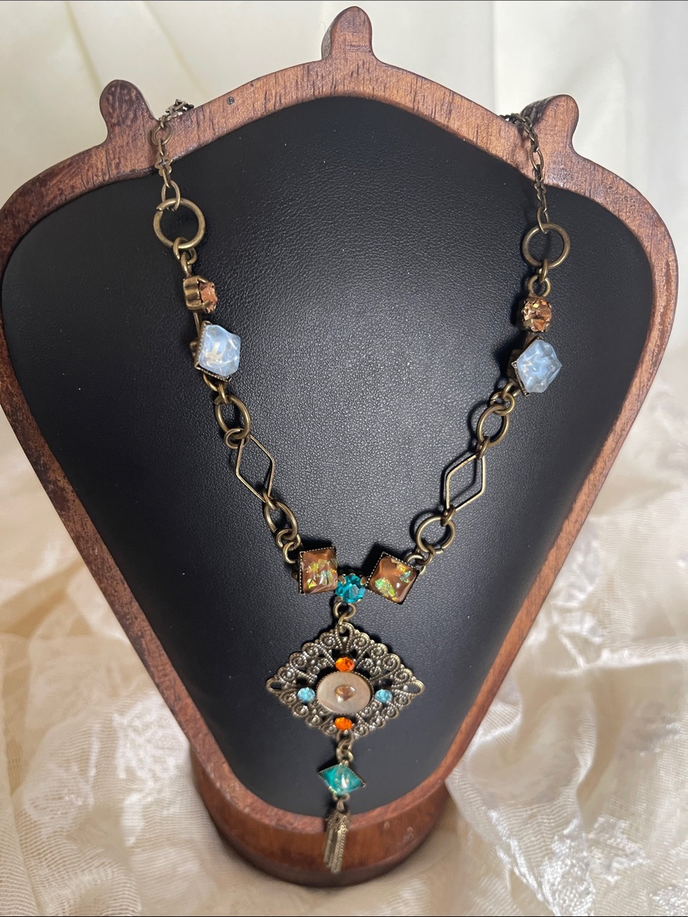 Antique Bronze Filigree Pendant Necklace with Turquoise and Orange Accents